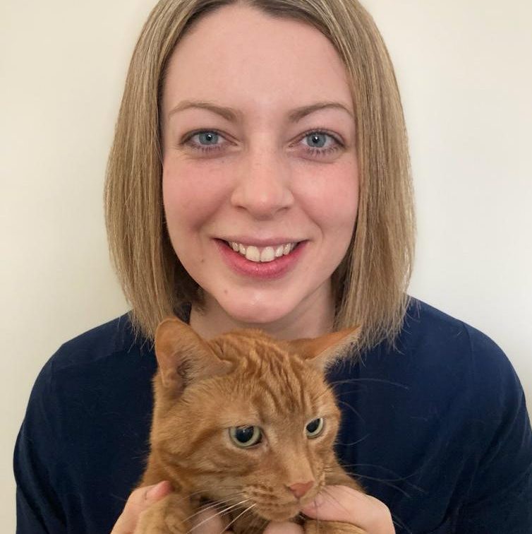 Cat writer Dr Gemma Cliffin MRCVS holding her ginger cat