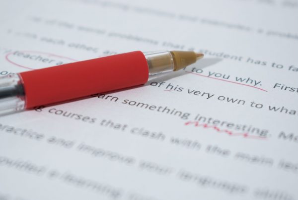 A red pen signifies our veterinary proofreading service